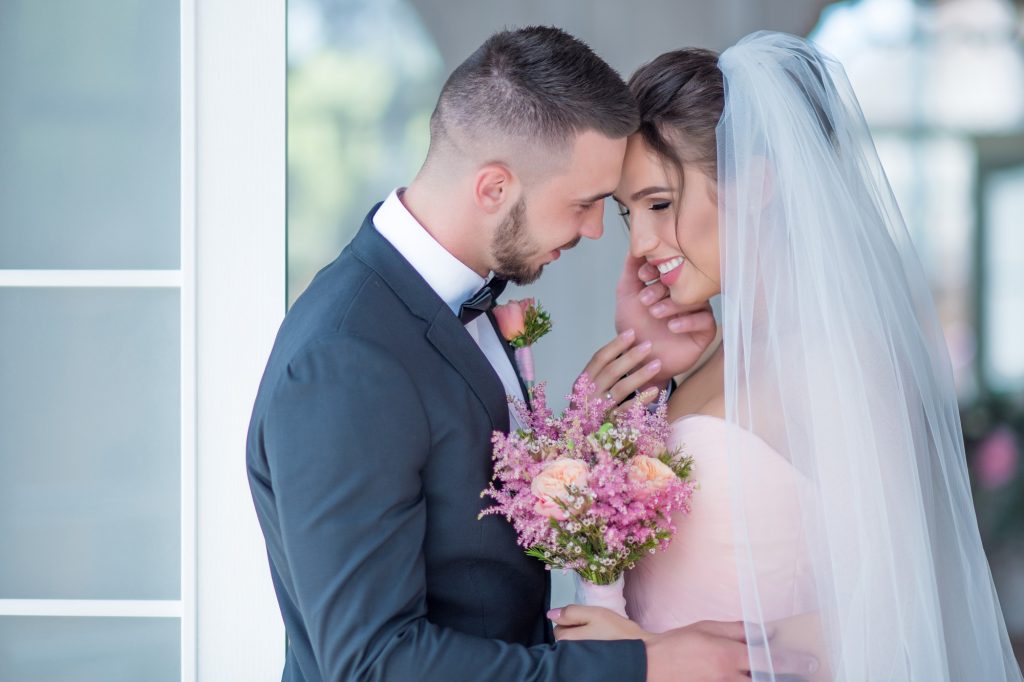 Groom and bride capturing their wedding moments